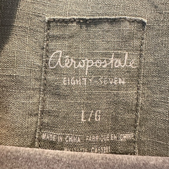 Button down shirt with sweater back and cute detailing - Picture 4 of 4